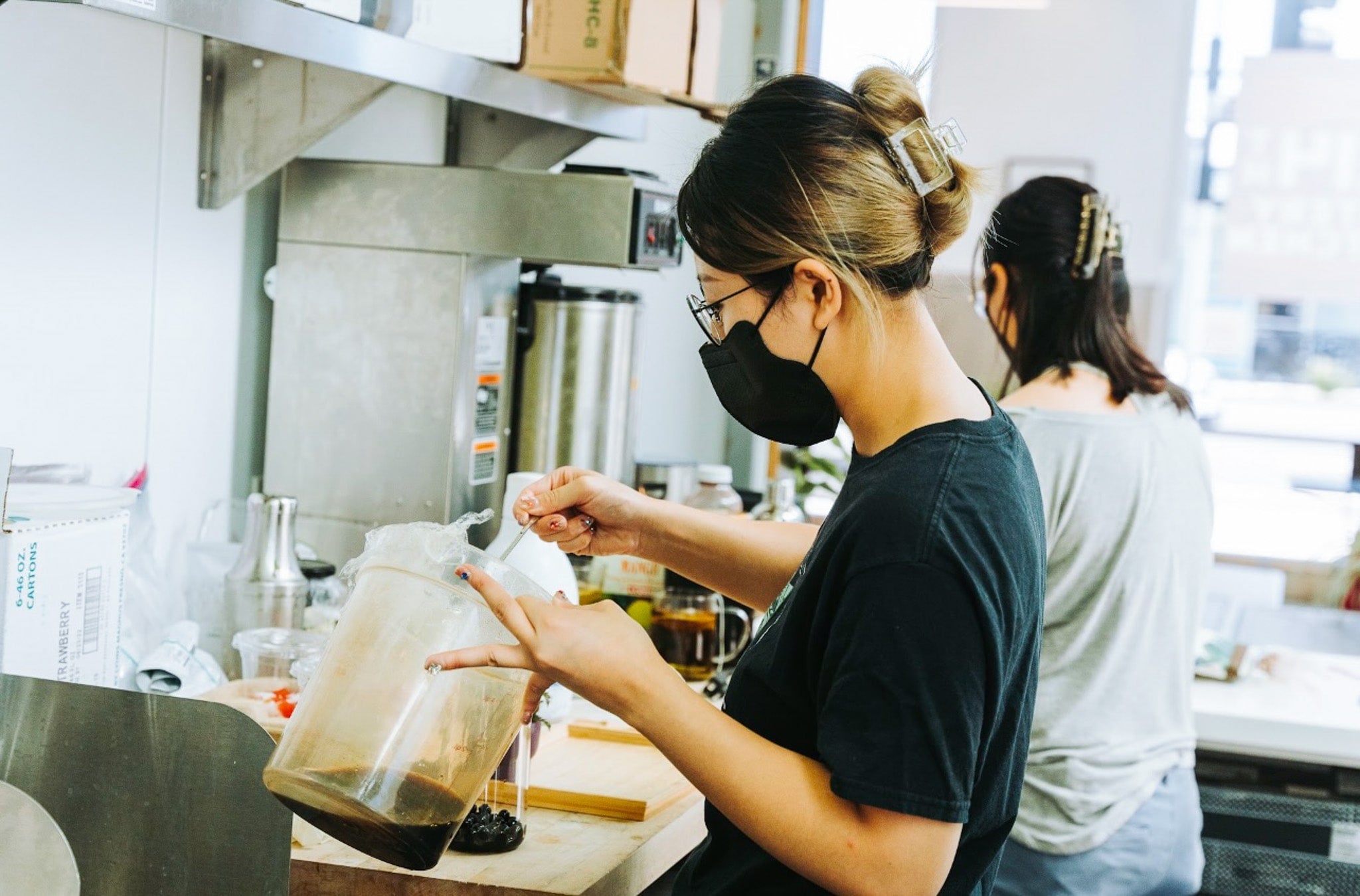 Meimei and Koei working the cafe